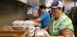 DC Staff Prepping Food Delivery